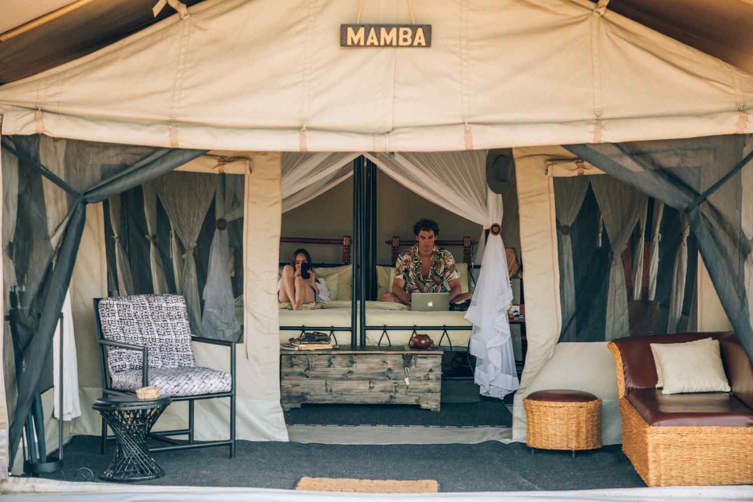 Serengeti Tortilis Camp tent with private veranda and acacia trees