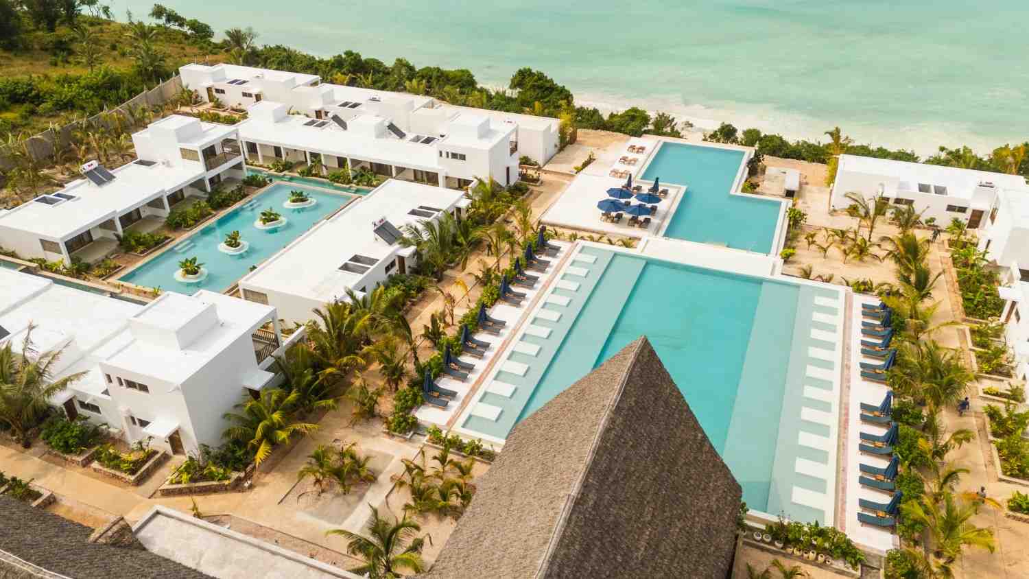 Central pool and sun loungers at Legendary Zanzibar Beach Resort in Michamvi