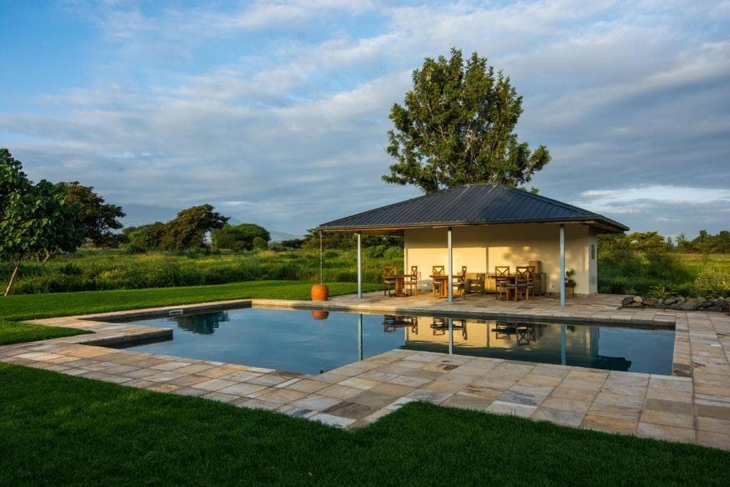Exterior view of Katambuga House — garden-retreat lodge in Arusha accommodation in Tanzania