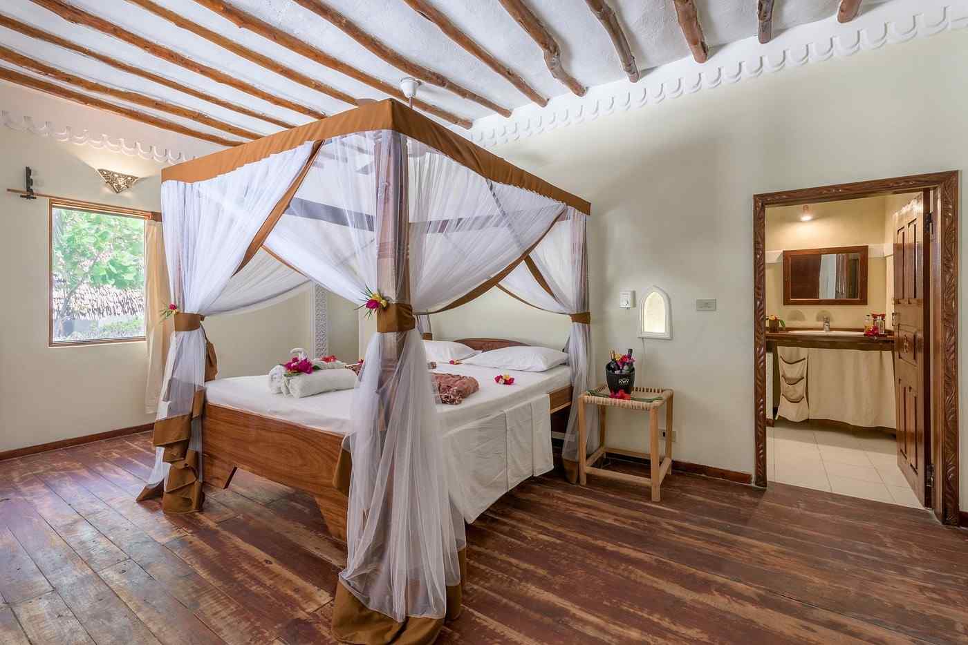Exterior view of hakuna majiwe beach lodge & spa — palm-lined bandas on zanzibar’s south-east coast accommodation in Tanzania