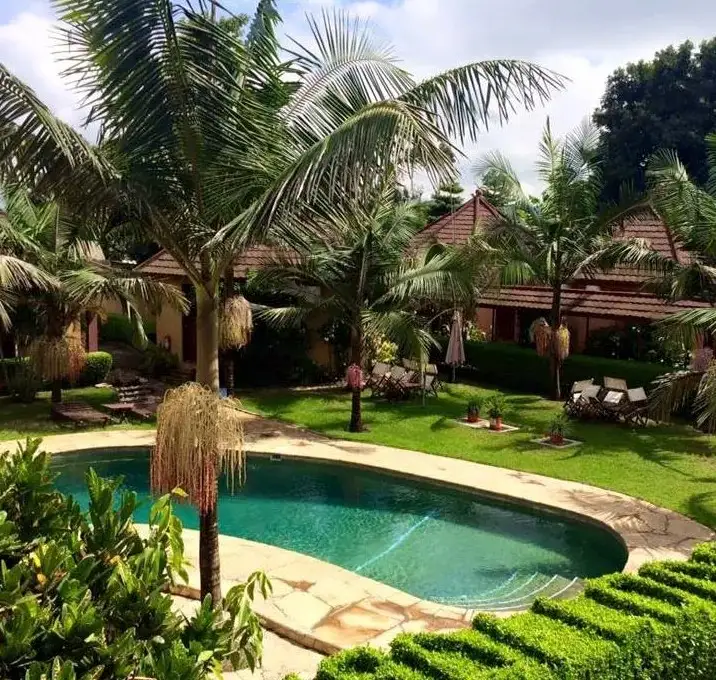 Ahadi Lodge gardens and cottages in Arusha
