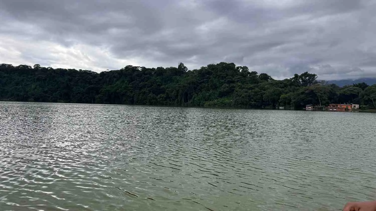 Canoeing on Lake Duluti with Mount Meru backdrop